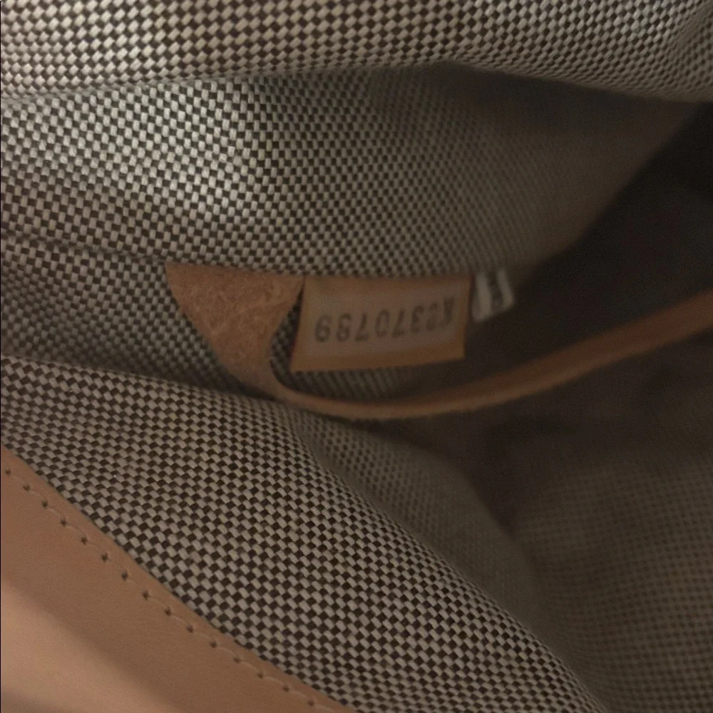 Dooney & Bourke Brown Monogrammed Women's Bucket Hobo Bag